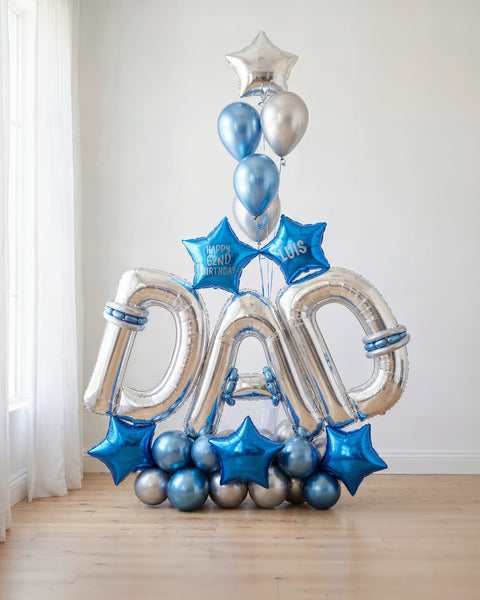 Bouquet de globos "Homenaje a Papá" en plata y azul, con letras DAD, estrellas, "Happy 62nd Birthday Luis" — Perú Balloons, Lima