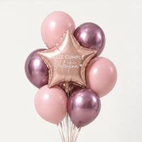 Bouquet de globos rosas y cromados con estrella oro rosa que dice Feliz cumple Valentina, sobre fondo claro.